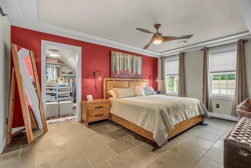 2 Morris Lane Rutland, MA 01543 - Photo 16 of 41 a spacious bedroom with a bed and a walk in closet