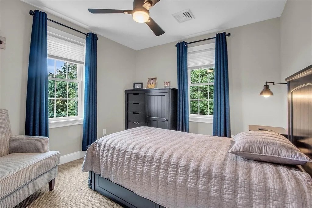 2 Morris Lane Rutland, MA 01543 - Photo 17 of 41 a bedroom with a large bed and a window