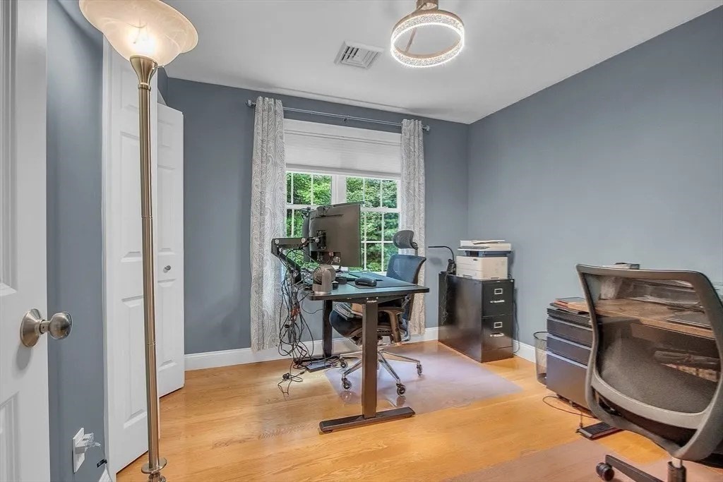2 Morris Lane Rutland, MA 01543 - Photo 21 of 41 a view of a livingroom with furniture window and a wooden floor