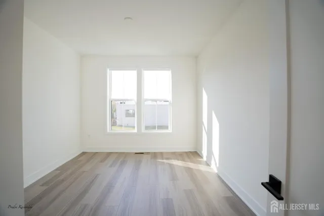 a bathroom with a double vanity sink and mirror