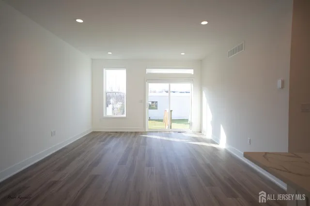 a bathroom with a sink vanity and a mirror
