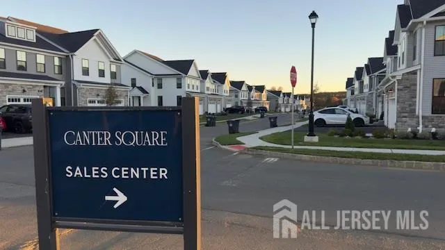 a sign on the side of a street