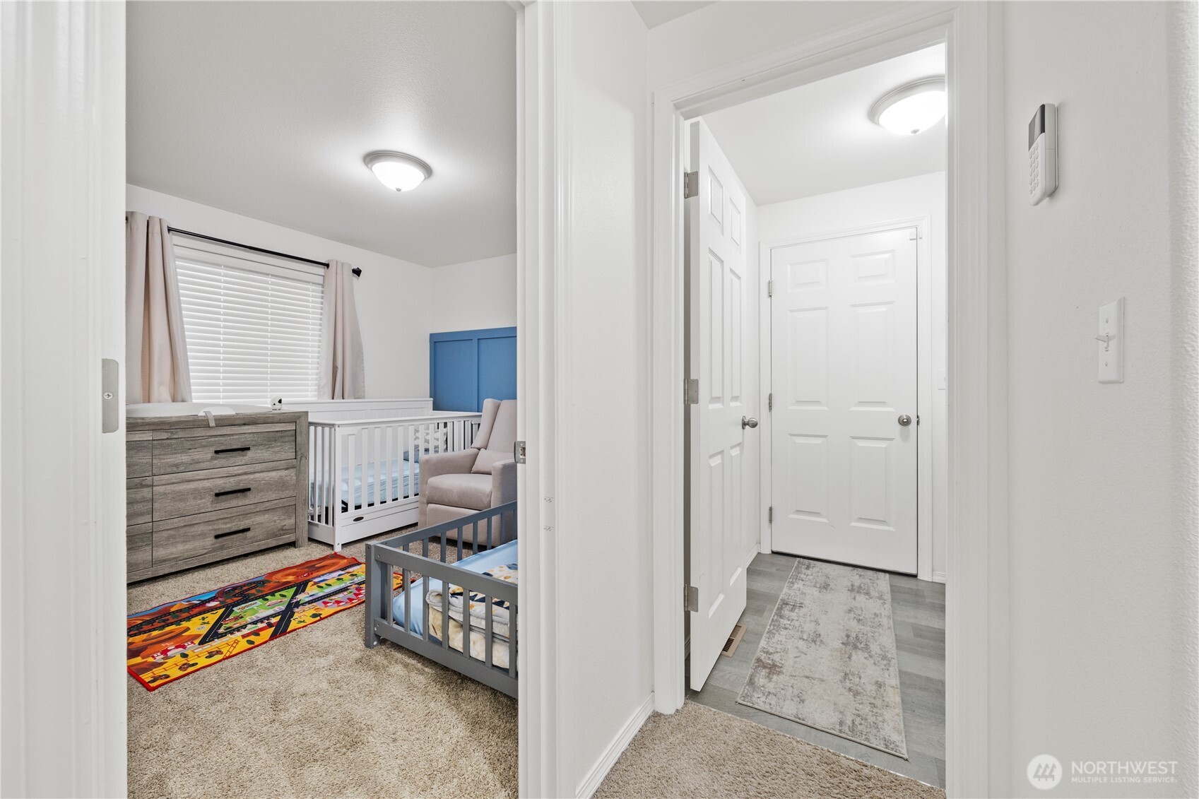 1045 Sandstone Street Othello, WA 99344 - Photo 14 of 20 a bedroom with furniture and a rug