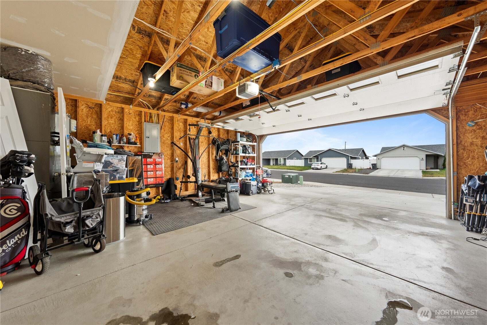 1045 Sandstone Street Othello, WA 99344 - Photo 19 of 20 a view of parking garage with cars