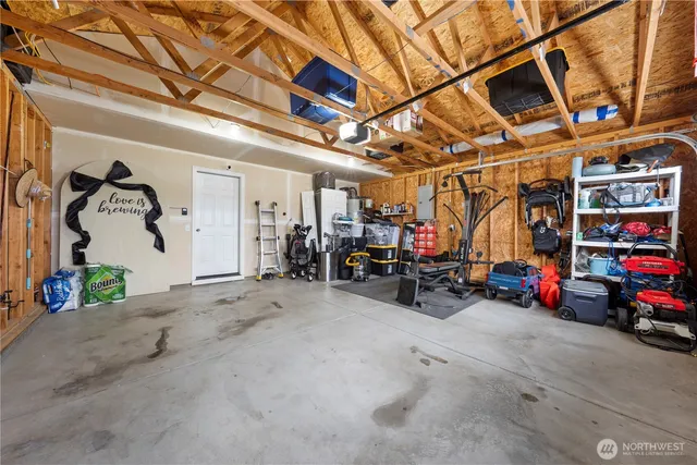 a view of a garage with parked cars