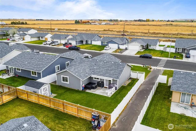 an aerial view of a house with a ocean view