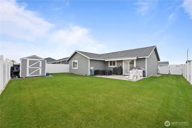 a front view of house with yard and porch