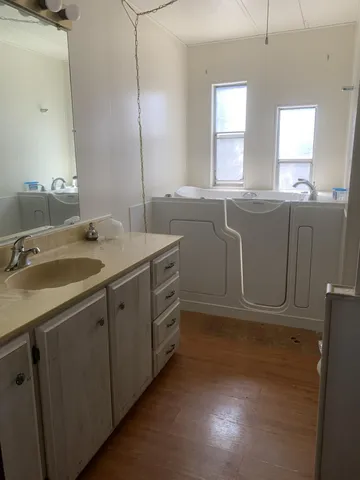 a bathroom with a sink and a vanity