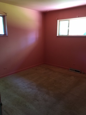 3 Crescent Road Lake Zurich, IL 60047 - Photo 6 of 10 an empty room with a window