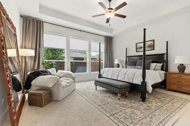 a bed room with a bed and a couch