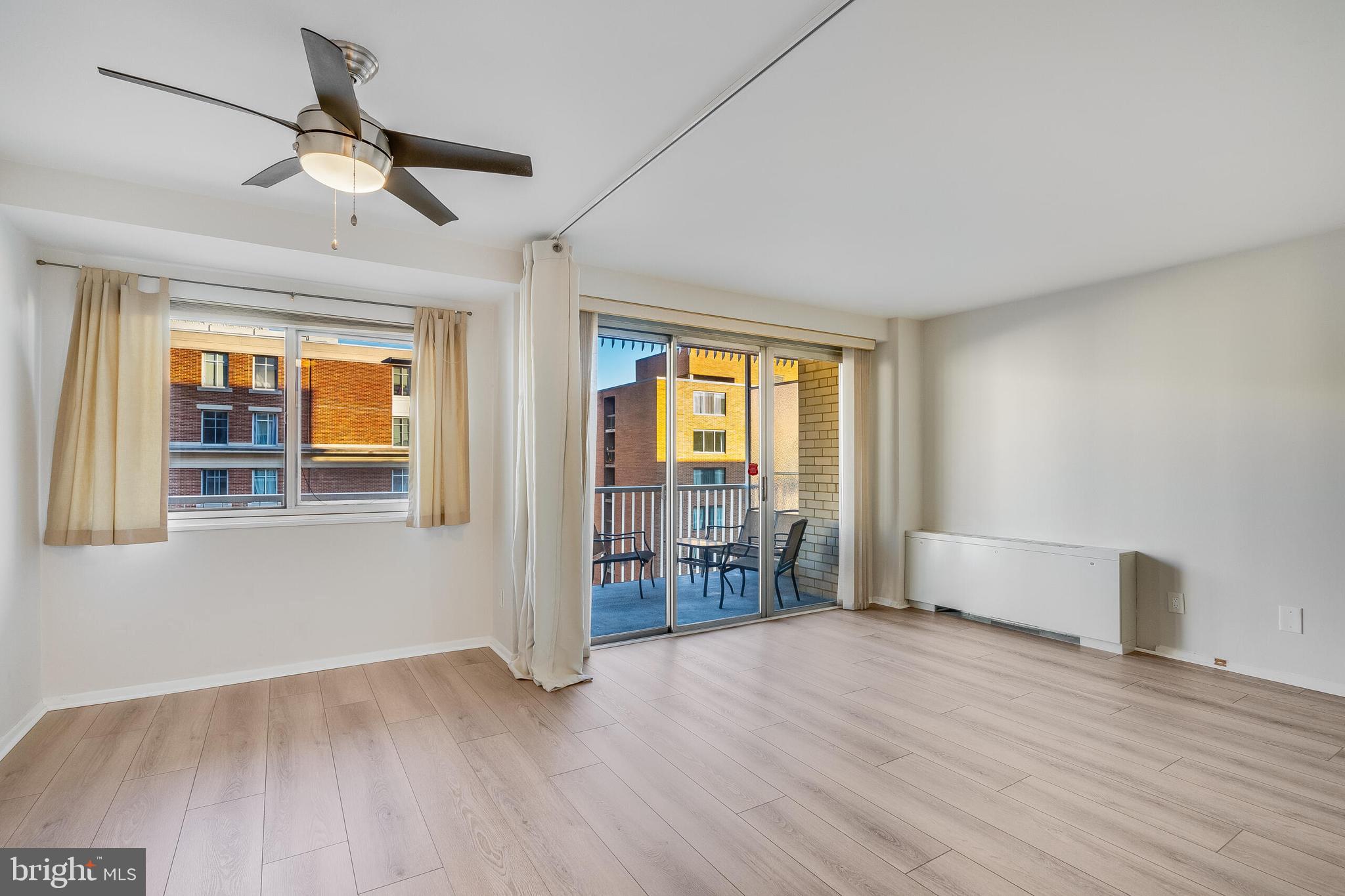 730 24th Street Northwest, Unit 708 Washington, DC 20037 - Photo 20 of 41 a view of empty room with wooden floor and fan