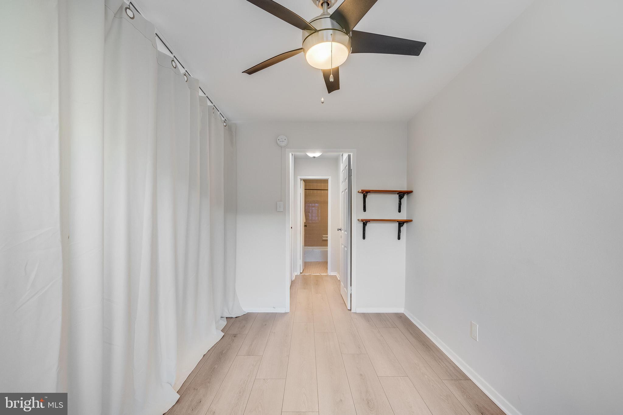730 24th Street Northwest, Unit 708 Washington, DC 20037 - Photo 27 of 41 wooden floor in an empty room