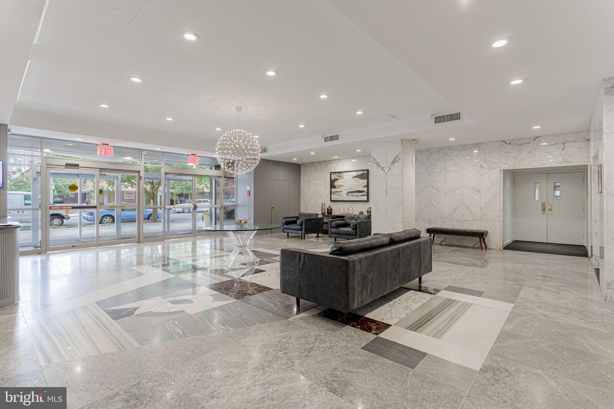 730 24th Street Northwest, Unit 708 Washington, DC 20037 - Photo 3 of 41 a large white kitchen with a large window
