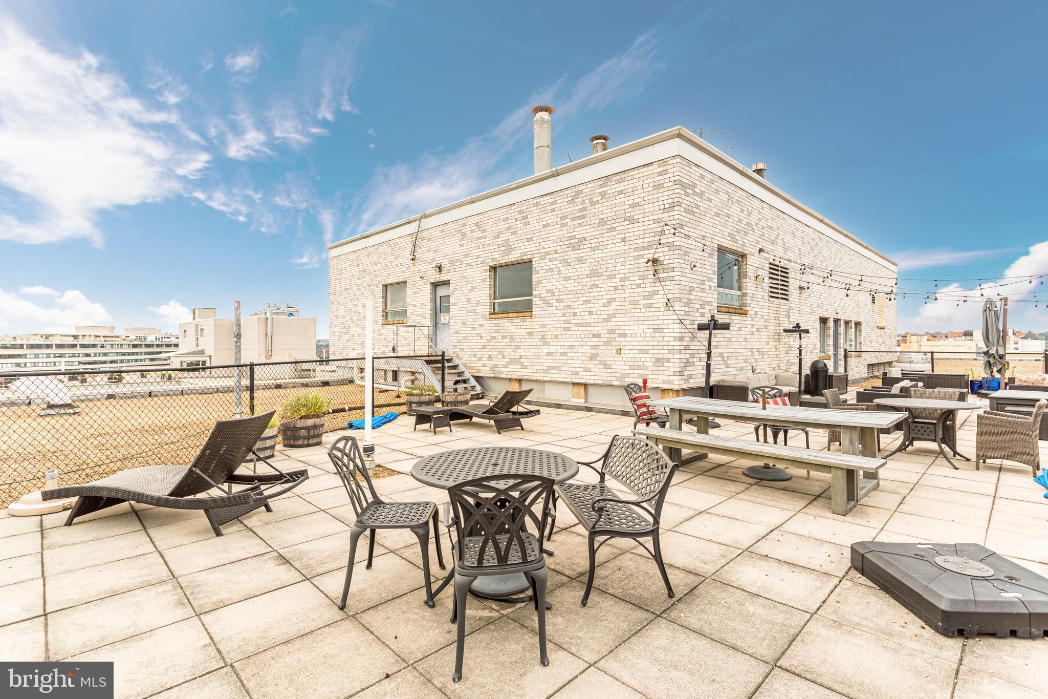 730 24th Street Northwest, Unit 708 Washington, DC 20037 - Photo 33 of 41 a view of a terrace with seating area