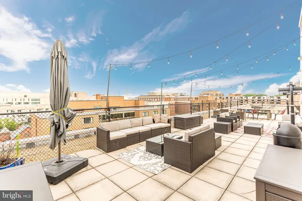 a view of a cars is parked in front of a building