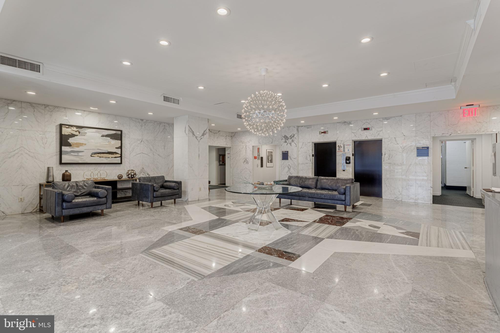 730 24th Street Northwest, Unit 708 Washington, DC 20037 - Photo 5 of 41 a living room with furniture a large window and flat screen tv
