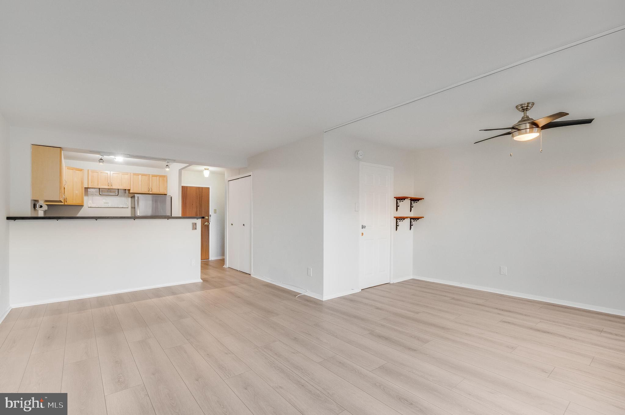 730 24th Street Northwest, Unit 708 Washington, DC 20037 - Photo 10 of 41 a view of a kitchen with wooden floor
