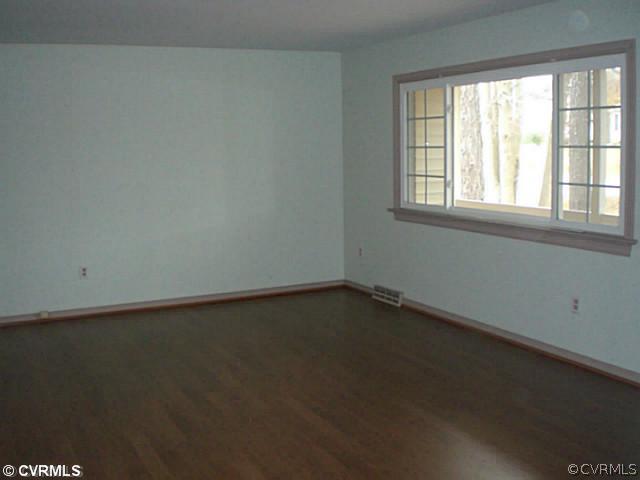 8001 Valencia Road Chesterfield, VA 23832 - Photo 3 of 14 an empty room with a window