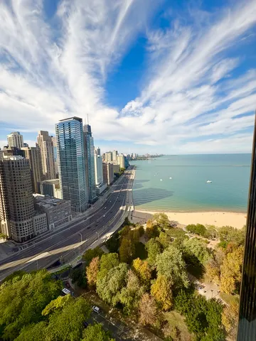 a view of a water with a building in the background