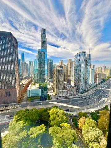 a view of swimming pool with outdoor seating