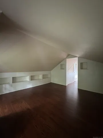 a en suite bathroom with a sink and a mirror
