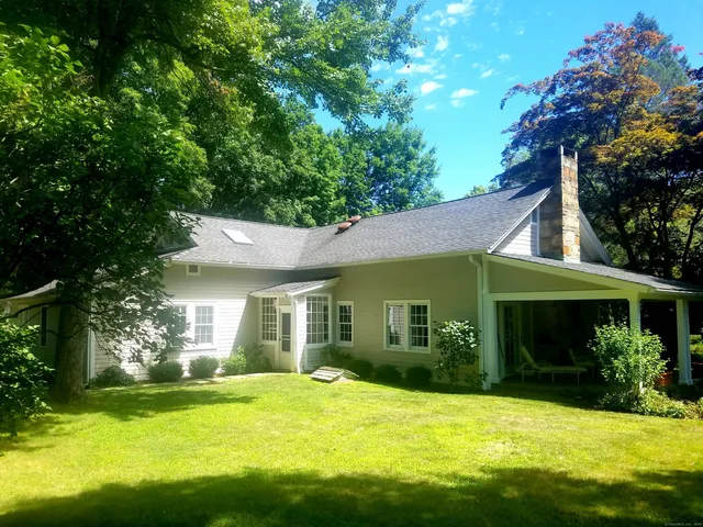 a view of a back yard of the house