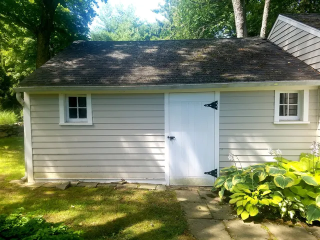 a view of swimming pool from a yard