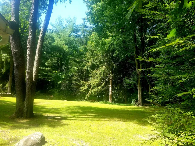 a bathroom with a sink vanity and mirror