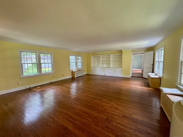 a view of livingroom with hardwood floor and window