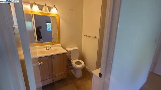a bathroom with a sink and toilet