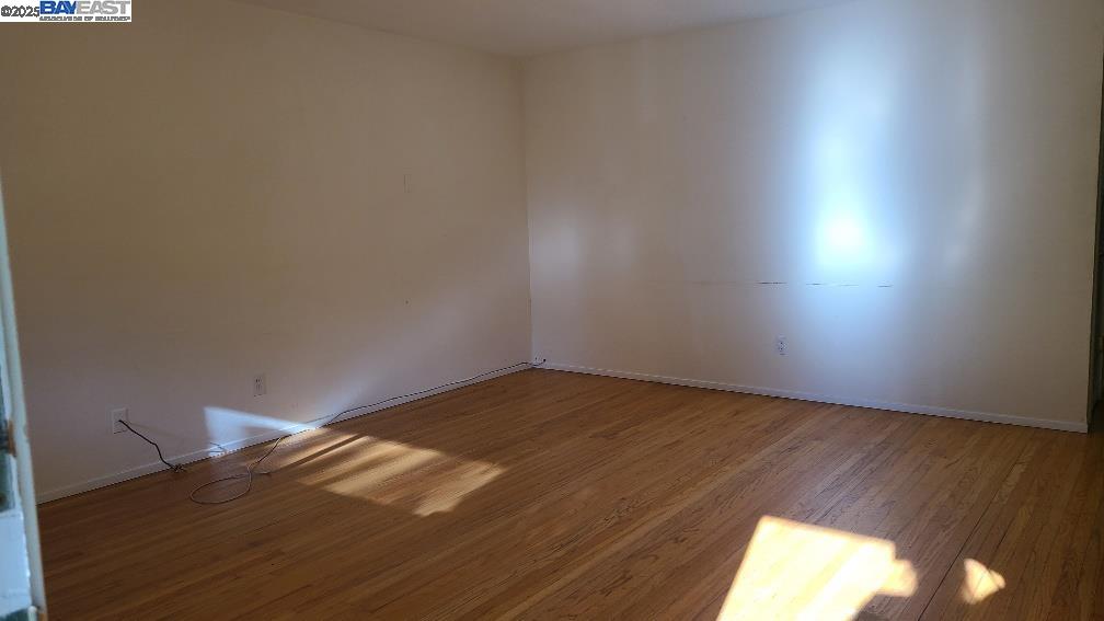 1501 L Street Davis, CA 95616 - Photo 4 of 23 a view of an empty room and wooden floor