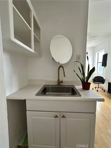 a sink with a washer and dryer
