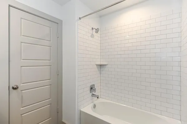 a bathroom with a bathtub