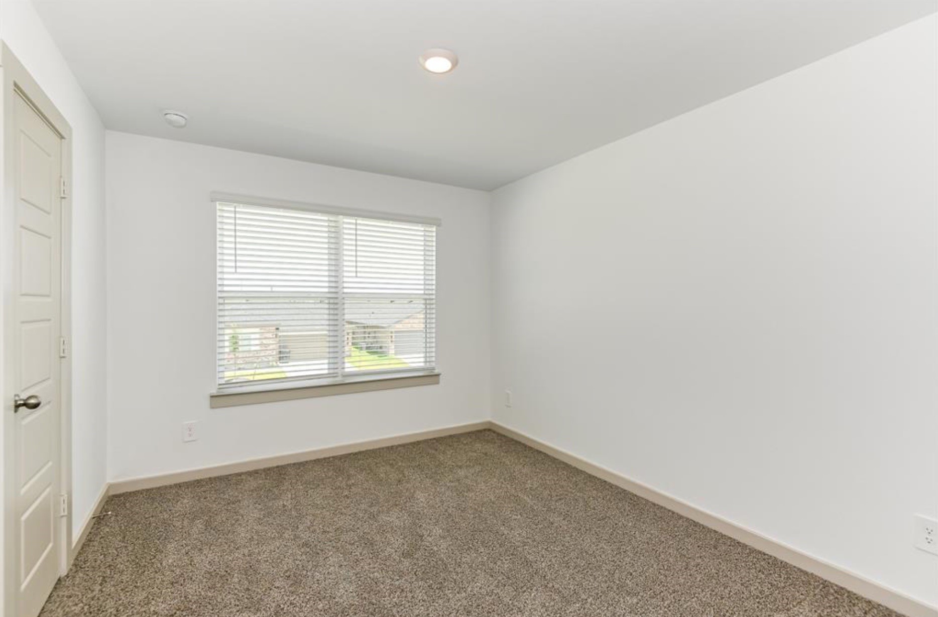 7918 Brumly Lane Rosharon, TX 77583 - Photo 17 of 34 an empty room with a window