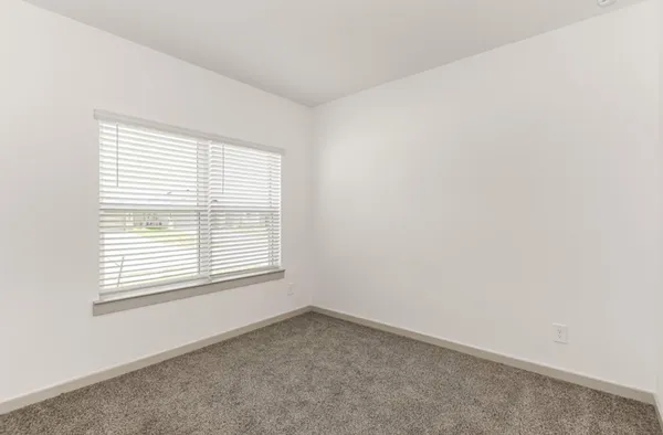 an empty room with closet