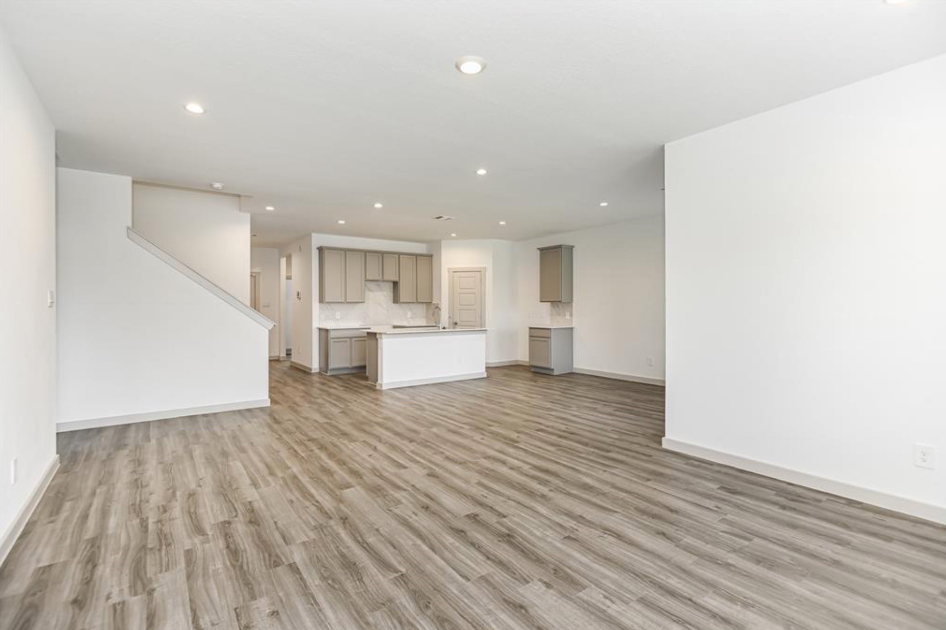 7918 Brumly Lane Rosharon, TX 77583 - Photo 7 of 34 a view of kitchen and wooden floor