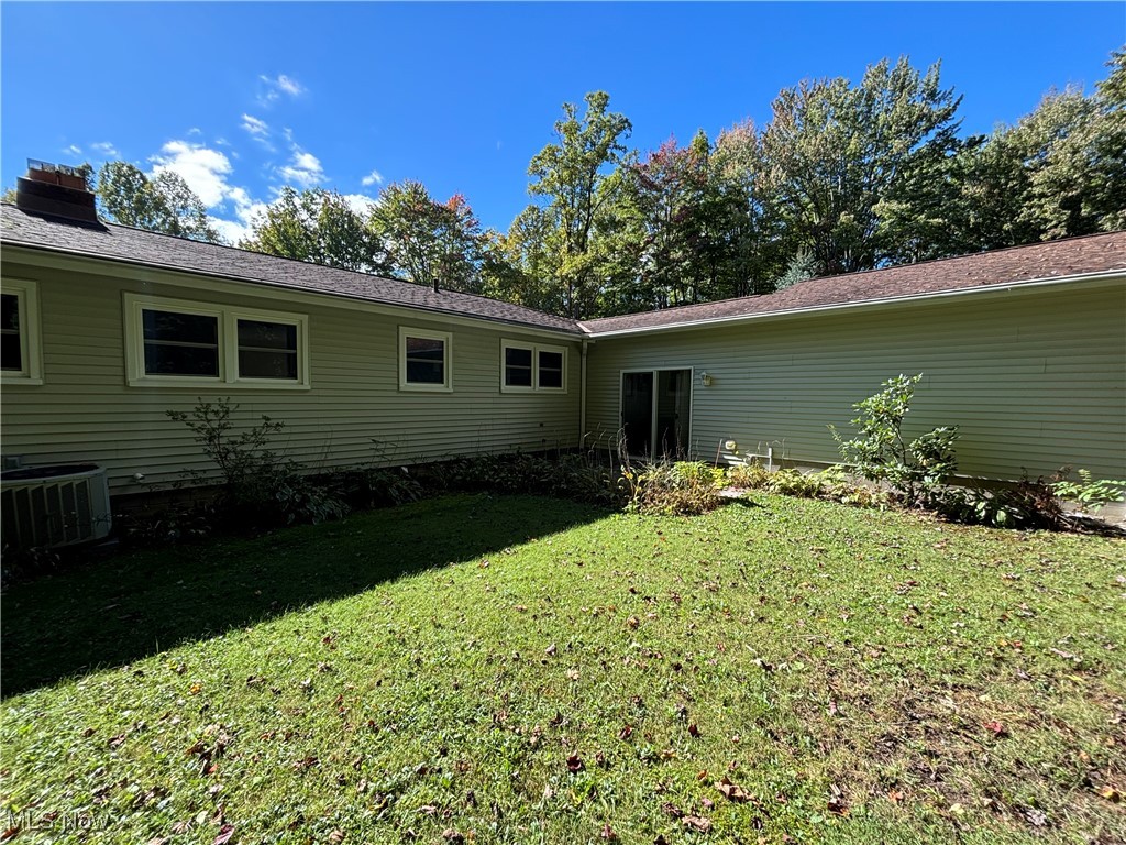 10708 Sherman Road Chardon, OH 44024 - Photo 29 of 31 Back Patio Overlooking Private Wooded Lot