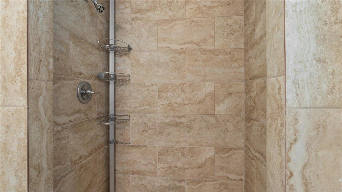 5596 Rich Road Memphis, TN 38120 - Photo 16 of 34 a bathroom with a shower
