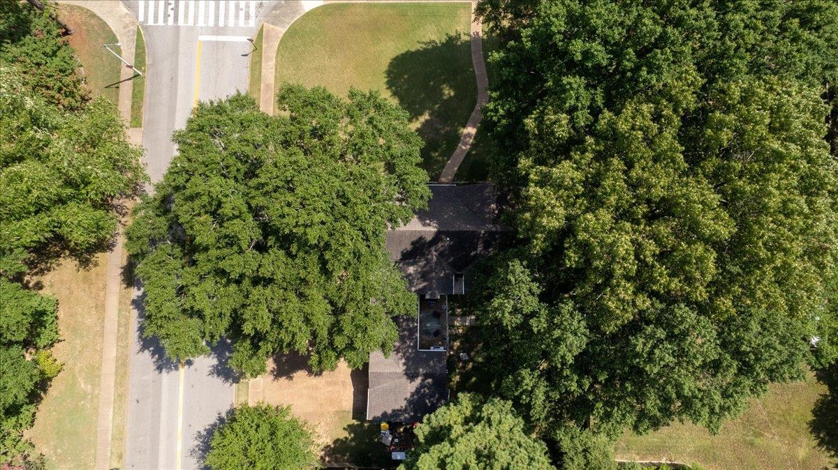 5596 Rich Road Memphis, TN 38120 - Photo 29 of 34 an aerial view of a residential houses with outdoor space and trees