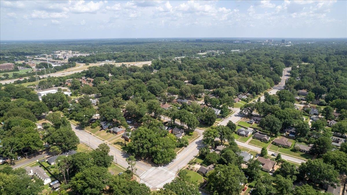 5596 Rich Road Memphis, TN 38120 - Photo 34 of 34 an aerial view of residential houses with outdoor space and trees
