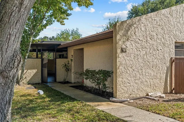 a view of a back yard of the house