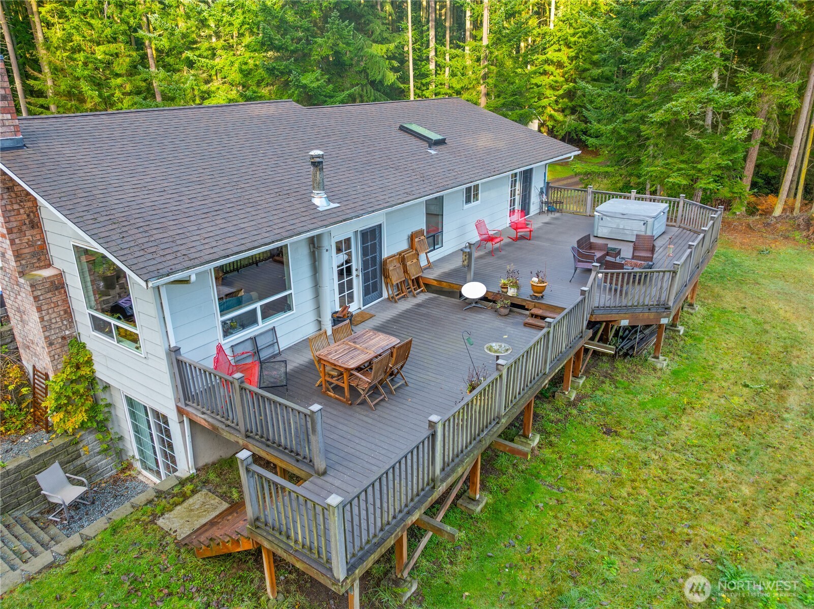 1881 Fort Nugent Road Oak Harbor, WA 98277 - Photo 36 of 38 a aerial view of a house with table and chairs