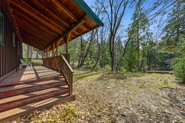 a view of a backyard of a house
