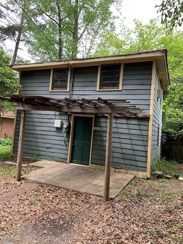 a front view of a house with a garage