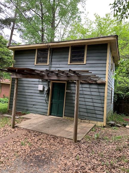 a front view of a house with a garage