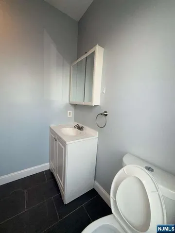 a bathroom with a sink and a toilet