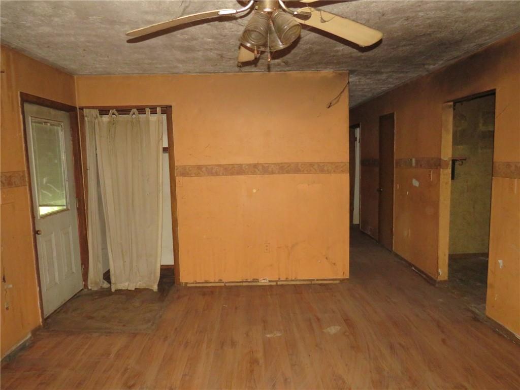 110 Tate Road Hookstown, PA 15050 - Photo 17 of 26 an empty room with wooden floor