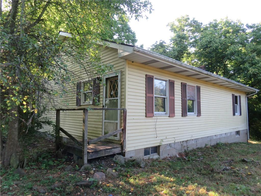 110 Tate Road Hookstown, PA 15050 - Photo 26 of 26 a front view of a house with garden