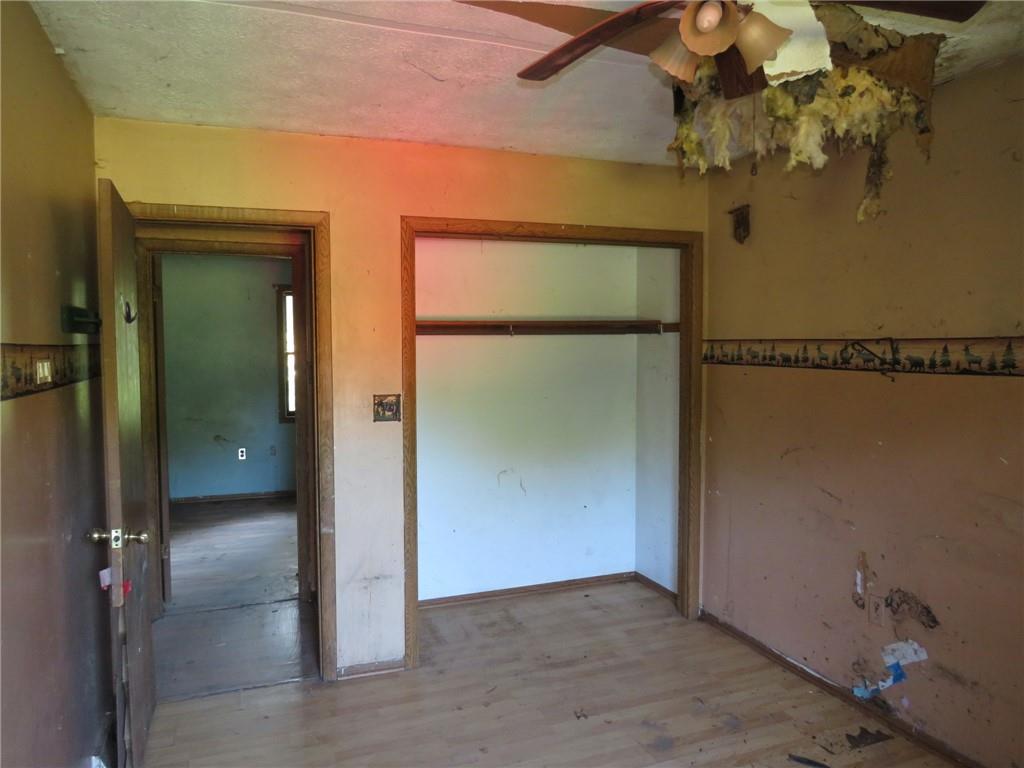 110 Tate Road Hookstown, PA 15050 - Photo 3 of 26 an empty room with a mirror