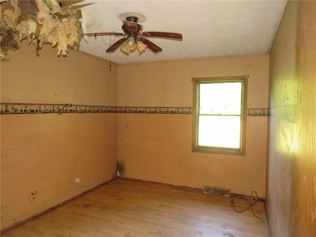 110 Tate Road Hookstown, PA 15050 - Photo 4 of 26 a view of a room with window and ceiling fan